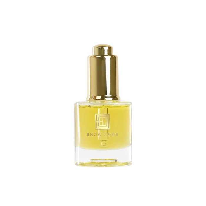 Brow Gold Nourishing Brow Growth Oil with natural ingredients in a glass bottle.