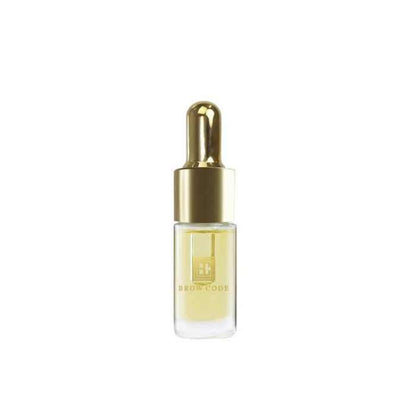 Brow Gold Nourishing Brow Growth Oil bottle with natural oils for fuller, stronger brows