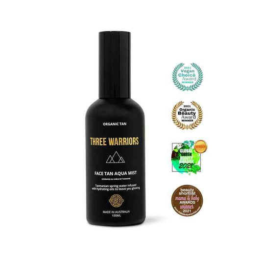 Three Warriors Face Tan Aqua Mist bottle with award logos for vegan choice, organic beauty, global green, and beauty shortlist 2021