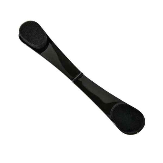 Black self tan back applicator with dual foam sponges and curved foldable handle for easy tanning